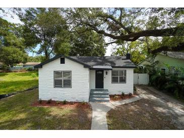 Photo one of 6911 N Highland Ave Tampa FL 33604 | MLS W7869339