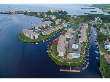 Aerial view of condo building and waterfront at 8141 Aquila St # 347, Port Richey, FL 34668