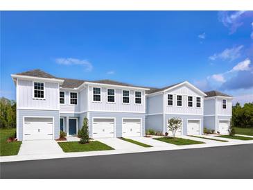 New townhouses with two-car garages and attractive landscaping at 4612 Old Blush St, Lakewood Ranch, FL 34211