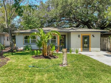 Charming updated home with lush landscaping and inviting front porch at 4629 26Th S Ave, St Petersburg, FL 33711