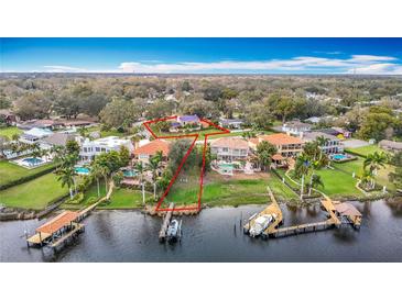 Waterfront homes boasting private docks and pools offer luxurious living amid lush landscaping at 4929 N River Shore Dr # A, Tampa, FL 33603