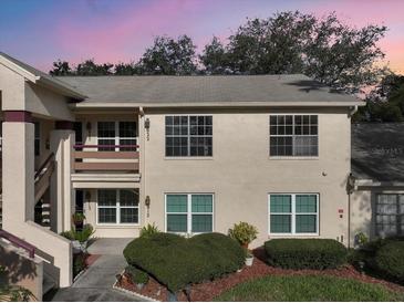 Charming two-story condo featuring well-maintained landscaping and a private entrance at 7828 Hardwick Dr # 922, New Port Richey, FL 34653