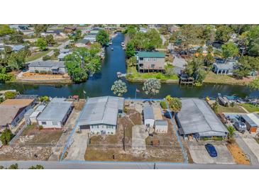 Waterfront home with boat access and mature landscaping at 6448 W Richard Dr, Weeki Wachee, FL 34607