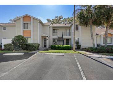 Two-story condo with neutral colors and landscaped grounds in a quiet community at 8006 Picketts Ct # 8006, Weeki Wachee, FL 34613