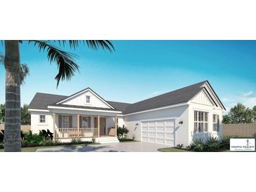 Charming single-Gathering home featuring a welcoming front porch and an attached two-car garage, set against a clear blue sky at 4112 Southern Valley Loop, Brooksville, FL 34601