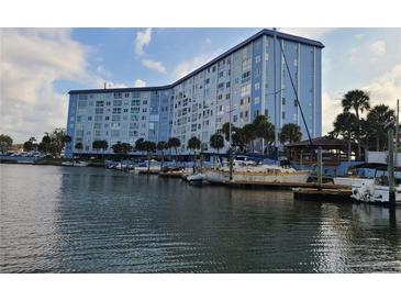 Waterfront condominium with boat slips on the water, offering convenient access to boating and water activities at 4939 Floramar Ter # 810, New Port Richey, FL 34652