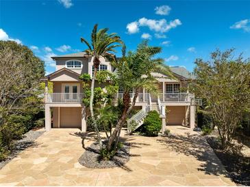 Charming two-story home with a spacious driveway and well-maintained landscaping at 5500 Leahy Ln, New Port Richey, FL 34652