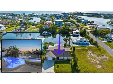 Waterfront home with boat dock and lift offers scenic views, lush landscaping, and easy access to the open water at 4503 Jacona Dr, Hernando Beach, FL 34607