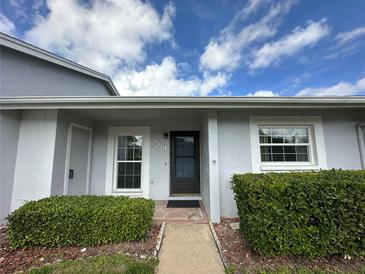 Charming home featuring a tidy front entrance with neat landscaping and a well-maintained exterior at 12541 Dearborn Dr # B, Hudson, FL 34667