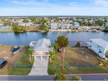 Waterfront property boasts ample land, perfect for building, with easy canal access and serene surroundings at 3340 Oleander, Hernando Beach, FL 34607