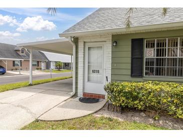 Charming single-story home with a carport and well-maintained front yard at 6219 Wilds Dr # 11A, New Port Richey, FL 34653