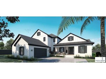 Stunning exterior elevation with modern design, featuring a two-car garage, covered porch, and sleek black and white accents at 5457 Creek Ridge Rd, Brooksville, FL 34601