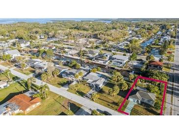 Waterfront community view of canals, homes and mature trees offering serene coastal living at 5447 Quist Dr, Port Richey, FL 34668