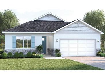 Charming single-Gathering home featuring a two-car garage, stone accents and manicured lawn at 9533 Vibrant Ln, Venice, FL 34292