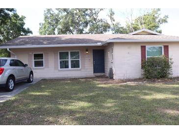 Charming single-story home featuring a well-maintained front yard and a welcoming entrance at 101 Sheryl Lynn Dr, Brandon, FL 33510