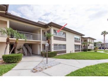 Charming condo with well-maintained landscaping and a welcoming entryway at 5123 Topaz Ln # 206, New Port Richey, FL 34652