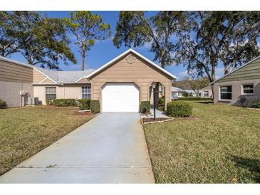Charming one-story home with a well-maintained lawn and inviting curb appeal at 9529 Bunker Hill Ct # 9529, New Port Richey, FL 34655