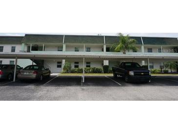 Multi-Gathering building featuring convenient covered parking at 5434 Chad Pl # 14, New Port Richey, FL 34652