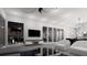 Open concept living room with sliding doors to patio at 2733 S East Ave, Sarasota, FL 34239