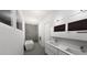 Spa-like bathroom with double vanity and freestanding tub at 2733 S East Ave, Sarasota, FL 34239