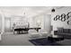 Open living and kitchen area with modern furniture at 2733 S East Ave, Sarasota, FL 34239