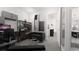 Home office with built-in shelving and kitchen access at 2733 S East Ave, Sarasota, FL 34239