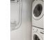 Stackable LG washer and dryer in a dedicated laundry closet at 1558 4Th St # 406, Sarasota, FL 34236