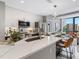 Modern kitchen with island and breakfast bar seating at 1558 4Th St # 406, Sarasota, FL 34236
