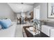 Bright and airy living room with a comfortable sofa and marble flooring at 1558 4Th St # 406, Sarasota, FL 34236