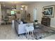Spacious living room features an open floor plan with kitchen views at 593 Azure Rd, Venice, FL 34293