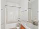 Modest bathroom featuring a shower-tub combination and laminate countertop at 2781 Shady Ave, North Port, FL 34286