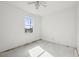 Sunlit bedroom offering a window with views of lush outdoors at 2781 Shady Ave, North Port, FL 34286