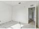 Neutral toned bedroom featuring an ensuite bathroom and lots of light at 2781 Shady Ave, North Port, FL 34286