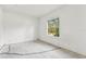 Bright bedroom with natural light from a window overlooking the front yard at 2781 Shady Ave, North Port, FL 34286