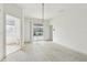 Bedroom showing access to a bathroom and sliding doors to the backyard at 2781 Shady Ave, North Port, FL 34286