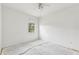 Clean bedroom with natural light from window and ceiling fan at 2781 Shady Ave, North Port, FL 34286