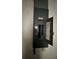Image of an electrical panel on a wall, with the door open showing circuit breakers and wiring diagrams at 2781 Shady Ave, North Port, FL 34286