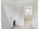 Hallway with tile flooring and a doorway leading to another room at 2781 Shady Ave, North Port, FL 34286