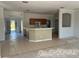 Kitchen with an island and view to backyard at 2781 Shady Ave, North Port, FL 34286