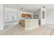 A kitchen with a brick island and view into living area at 2781 Shady Ave, North Port, FL 34286