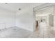 Spacious living room with tiled floors and arched openings at 2781 Shady Ave, North Port, FL 34286