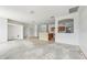 Open-concept layout with a brick-accented kitchen island at 2781 Shady Ave, North Port, FL 34286