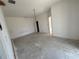 Empty Living room with bare floor and walls, and a window at 2781 Shady Ave, North Port, FL 34286