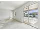 Bright living room with sliding glass doors at 2781 Shady Ave, North Port, FL 34286