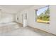 Bright living room, showing the door to the yard at 2781 Shady Ave, North Port, FL 34286