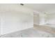 Spacious living room with tiled floors and arched openings at 2781 Shady Ave, North Port, FL 34286