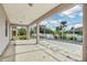 View of a screened-in pool with a large deck and patio area, enclosed for outdoor enjoyment at 2781 Shady Ave, North Port, FL 34286