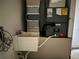 Image of an indoor utility area featuring a sink, water heater, and HVAC system at 2781 Shady Ave, North Port, FL 34286