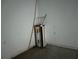 Close up shot of water heater in corner, in a utility area, and next to bare wall at 2781 Shady Ave, North Port, FL 34286