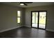 Bedroom with sliding glass doors leading to patio at 310 Day Break Cir, Port Charlotte, FL 33954